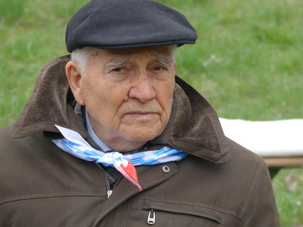 Julian Wieciech sitting on a bench.